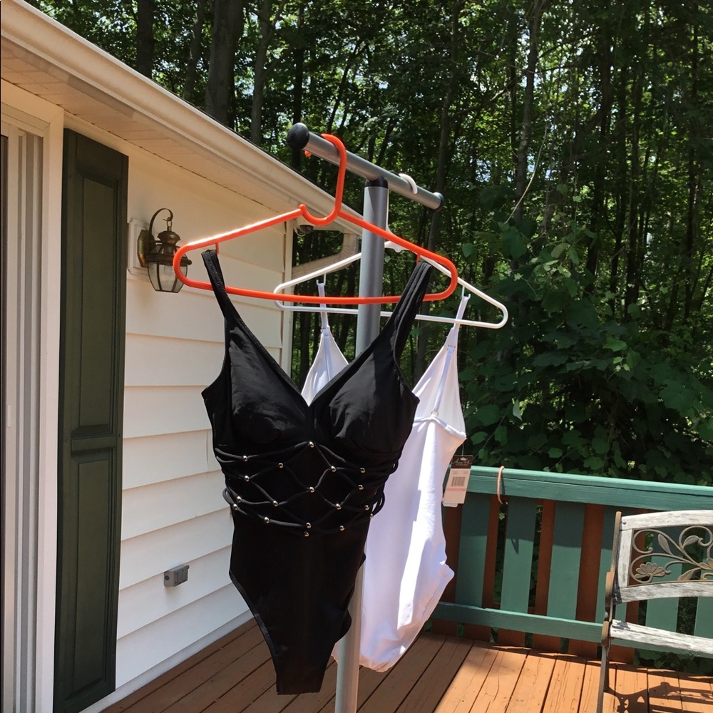 2 designer one-piece bathing suits.